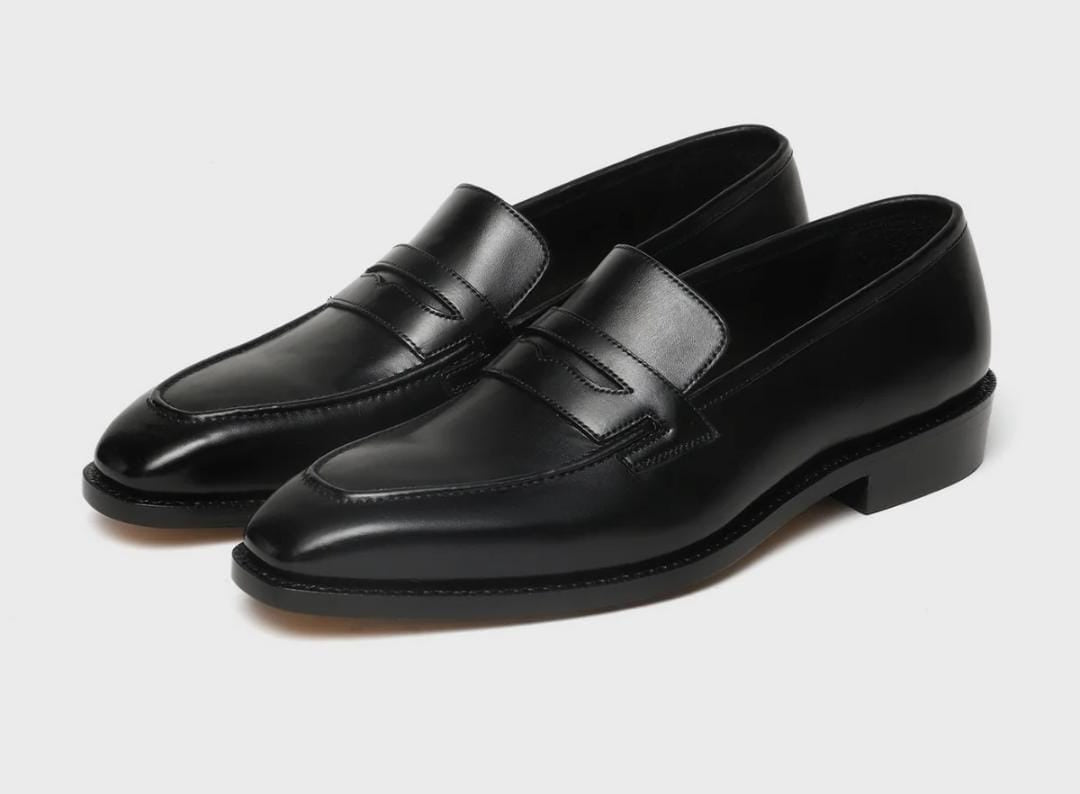 The Classic Noir Penny Loafers